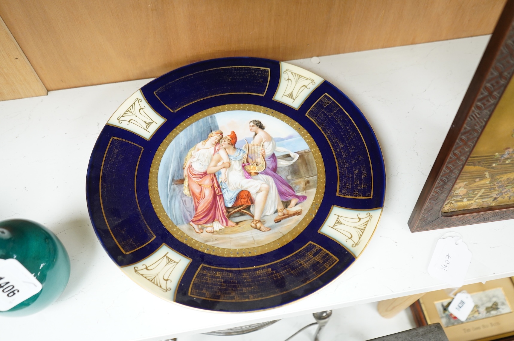 A pair of Vienna style porcelain chargers, early 20th century, 33cm